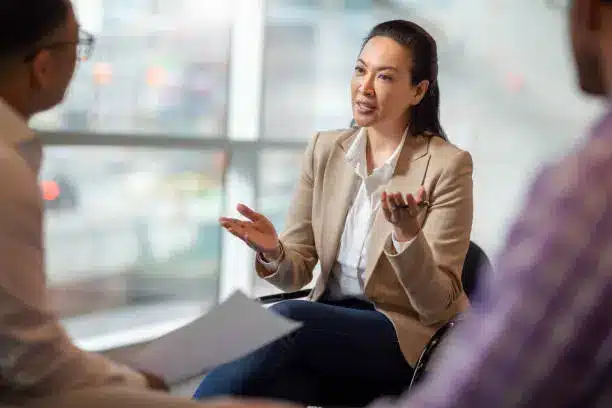 Performance reviews in healthcare discussion between manager and employee