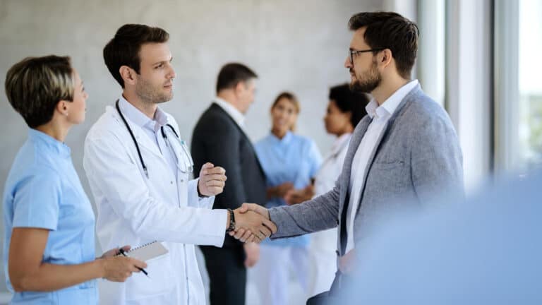 Multi-generational healthcare team collaborating to reduce silent turnover in healthcare